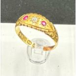 An antique 18ct gold diamond and ruby inset ring, approximate size m and weight 2.4g