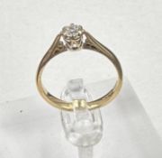 A 9ct and diamond (.25 ct) ring, approximate size P1/2