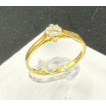 An 18ct diamond ring, yellow gold marked 750 (Approximate Total Weight 2g) Size N