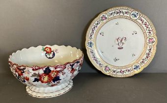 A La Courtelle plate with floral monogram and an ironstone floral bowl