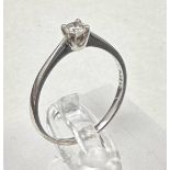 An 18ct white gold diamond ring, approximate size N