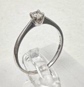 An 18ct white gold diamond ring, approximate size N