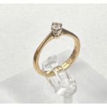 A 9ct gold diamond ring, approximate size N, (2.6g)