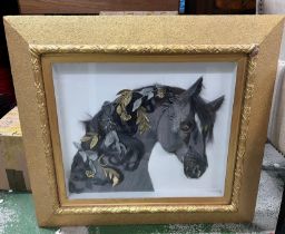 A mixed media picture of a horses head signed lower right