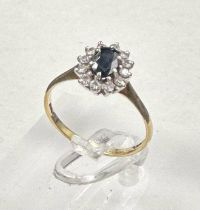 A 9ct gold sapphire and diamond ring in a daisy style, approximate size L.