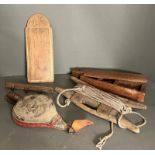 A selection of wooden decorative items including bellows