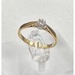 An 18ct diamond ring on yellow gold setting Size P