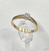 An 18ct diamond ring on yellow gold setting Size P