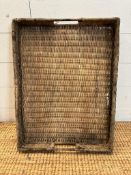 A rustic wicker two handled tray 40cm x 55cm