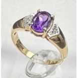 A 9ct gold amethyst and diamond ring, approximate size M1/2