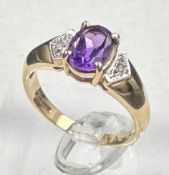 A 9ct gold amethyst and diamond ring, approximate size M1/2