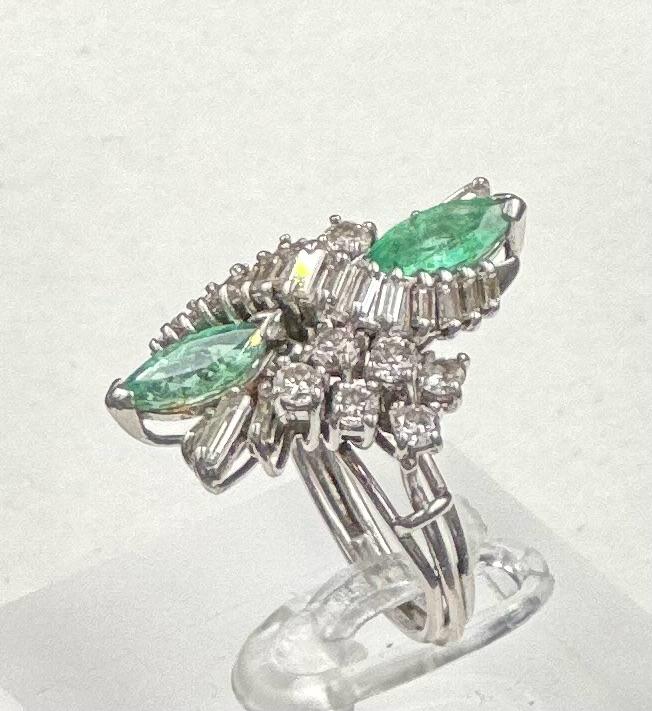 An emerald and diamond ring, designed a s a vertically set elongated cluster with two marquise cut - Image 9 of 11