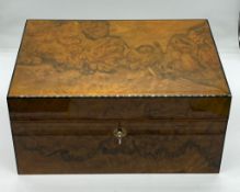 A wooden jewellery box