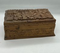 A carved oak box