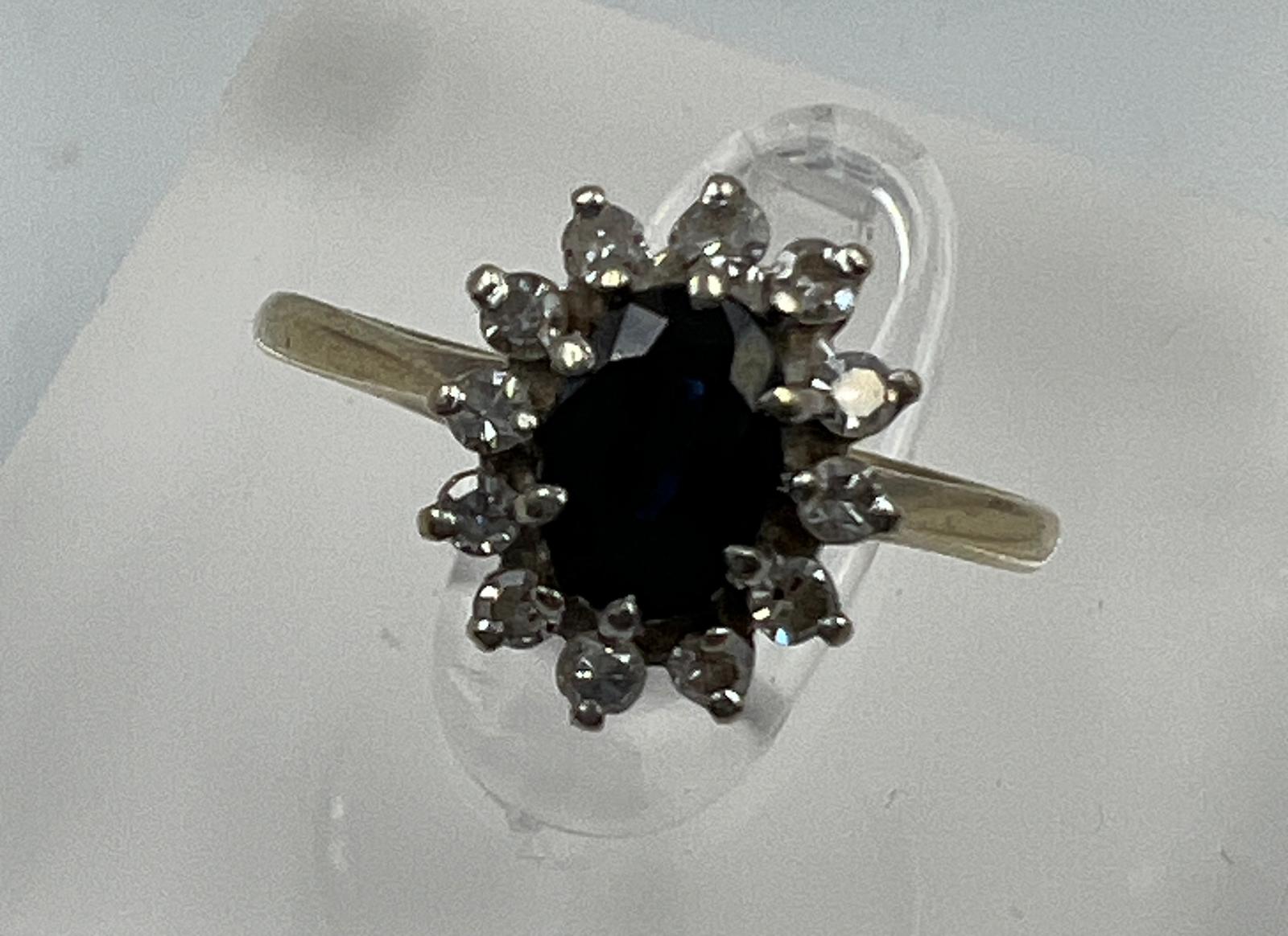 A 9ct gold sapphire and diamond ring in a daisy style, approximate size L. - Image 3 of 7