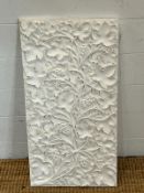 A plaster plaque with floral pattern 64cm x 33cm