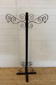 A black wrought iron hanging basket stand (H126cm)