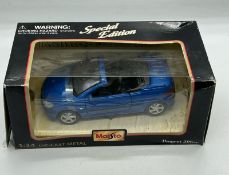 A Maisto special edition Peugeot 206 cc Diecast model car boxed