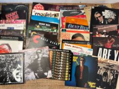 A selection of vinyl, various artist including Tina Turner, John Lennon etc