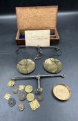 An 1843 set of portable weigh scales, with accompanying business card.