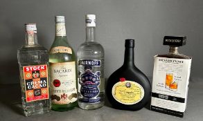 A selection of spirits (5) to include: Armagnac, Disaranno, Bacardi, Smirnoff Blue, and an