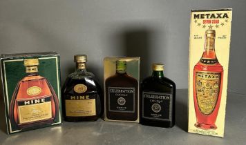 A Mixed selection of spirits to include: Camus celebration cognac, Hine cognac and a bottle of