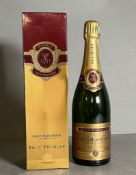 A bottle of Louis Roederer Brut Premier champagne, boxed