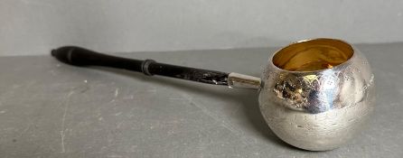 A silver, gilded toddy ladle with Spiers and Pond engraved and ebonised handle, approximate total