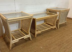 Two glass topped wicker effect conservatory side tables and a coffee table