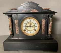 An eight day slate and marble mantel clock AF