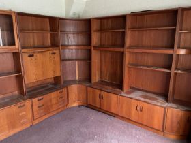 A Mid Century wall unit made by G-Plan comprising of four units, one glazed display unit, one drinks