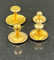 Gold shirt studs mixed, two 9ct gold (Approximate weight 1.5g) and two 18ct gold (Approximate weight