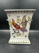 A Chinese square two handled urn or vase with a painted bird and butterfly pattern