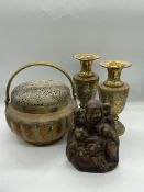 A collection of brass including a laughing buddha and hand warmer/censer