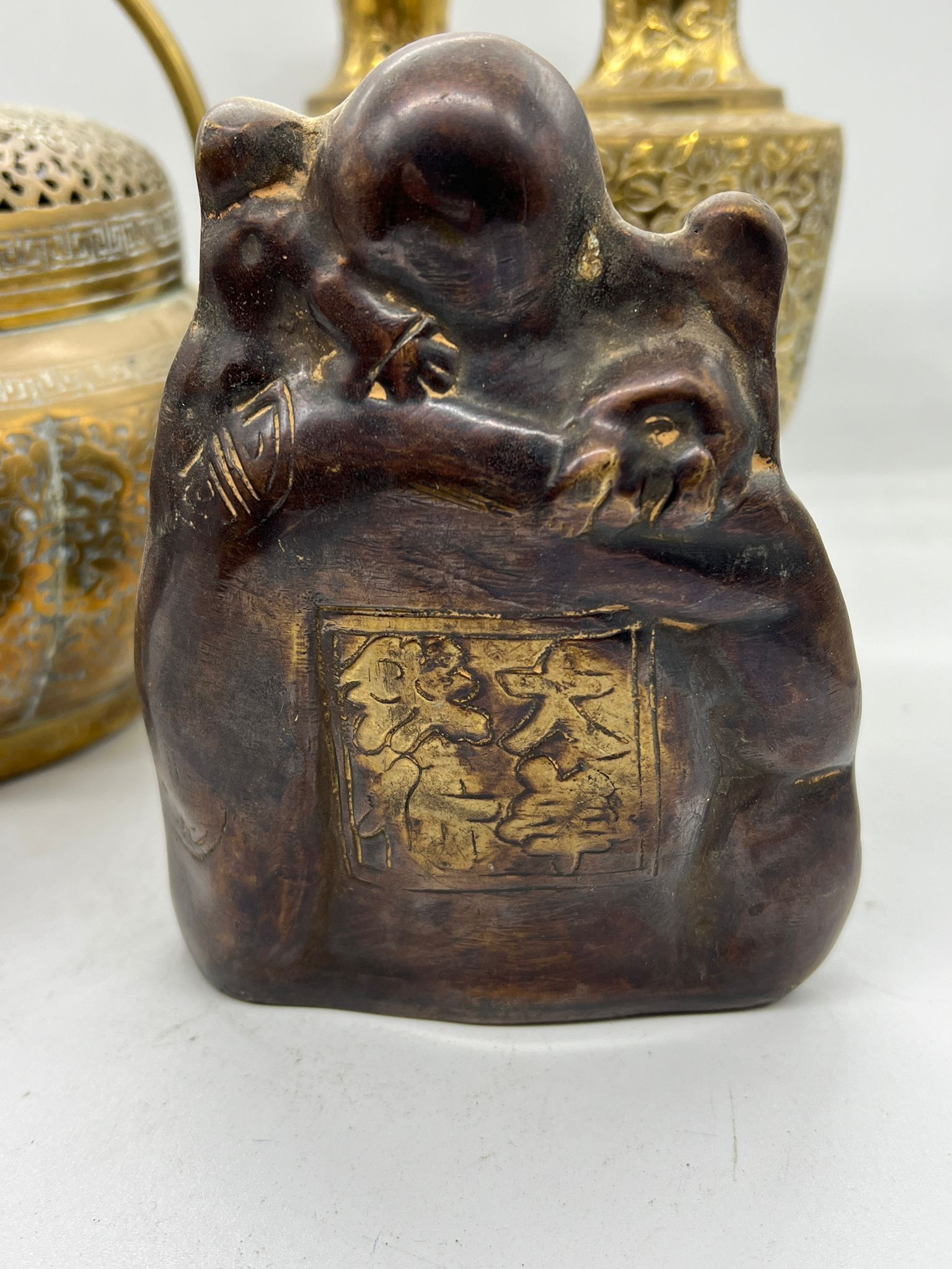 A collection of brass including a laughing buddha and hand warmer/censer - Image 2 of 5