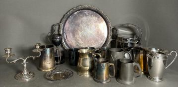 A selection of silver plate, pewter and white metal items to include tankards, tray and a candle