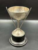 A small silver golf trophy, engraved and hallmarked for London.