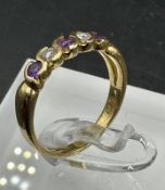 A 9ct gold carved claw set five stone garnet ring size R