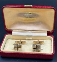 A boxed pair of woven knot design 9ct gold cuff links, approximate total weight 12.3g
