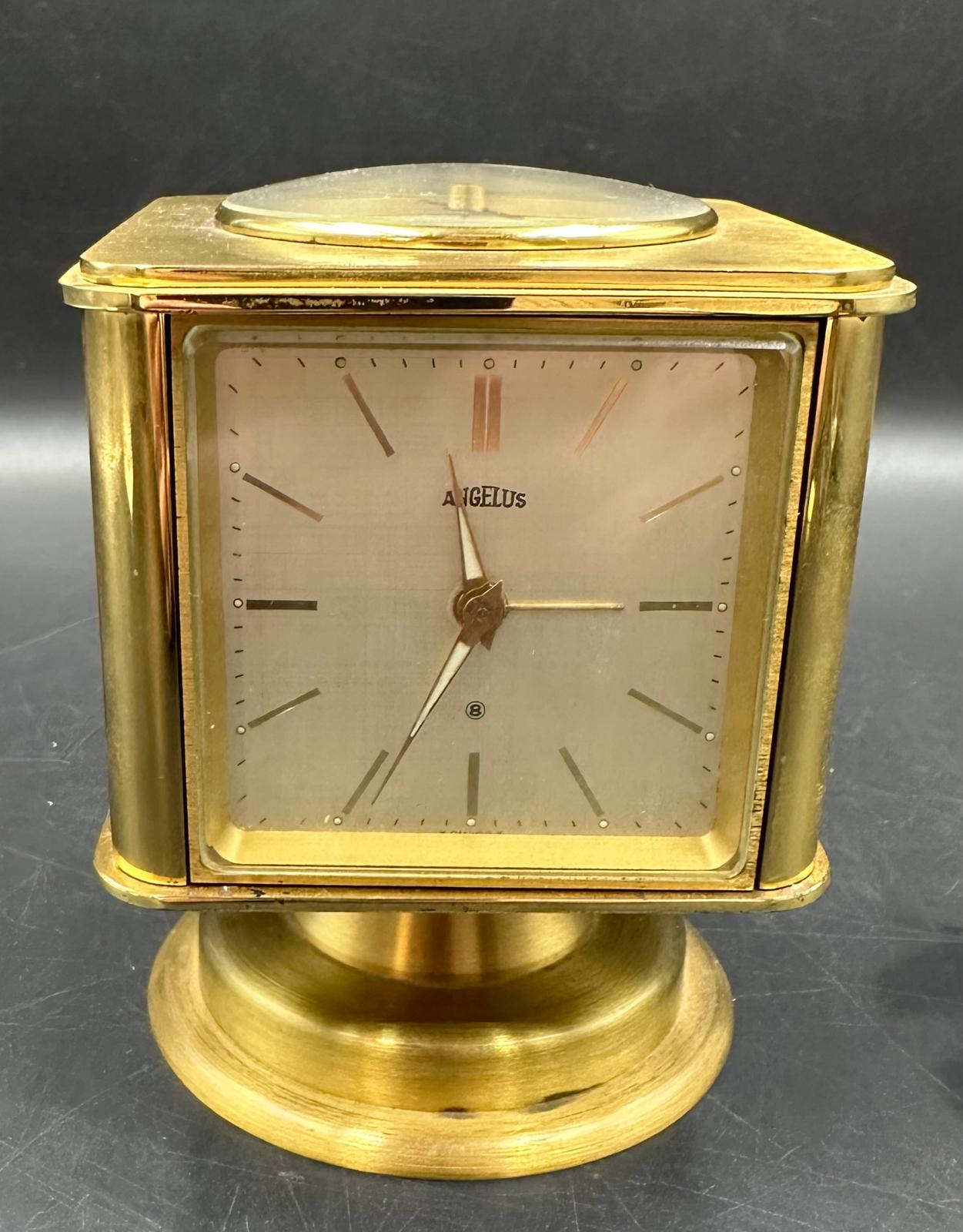 A vintage brass Angelus desk clock/weather station. Having rotating cube shaped body with alarm - Image 8 of 8