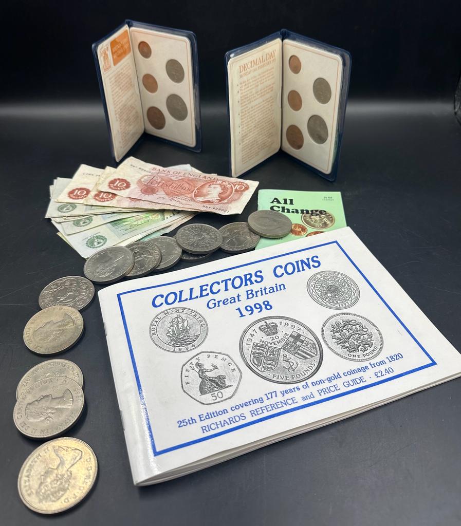 A selection of United Kingdom Crowns, several coin collecting books, two Britain's first decimal