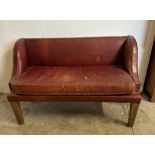 A two seater red leather bench seat with brass studded detail AF
