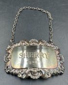 A silver hallmarked Sherry decanter label by A Chick & Sons Ltd London 1976