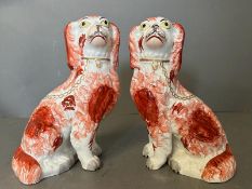 Two 19th Century Staffordshire red and white spaniels (H22.5cm)