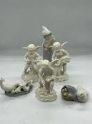 A selection of china ornaments including Lladro