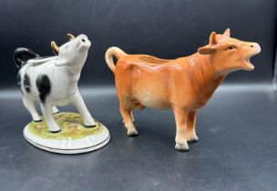 Two Cow creamers
