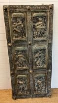 An Asia carved wooden panel, the six panels featuring dancing figurines, all boarded with a