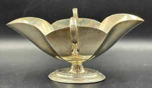 A silver two handled bowl, hallmarked for London 1895 by Thomas Bradbury & Sons, approximate