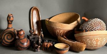 A selection of tribal treen and other Africana to include bowls, gourds and carved animals