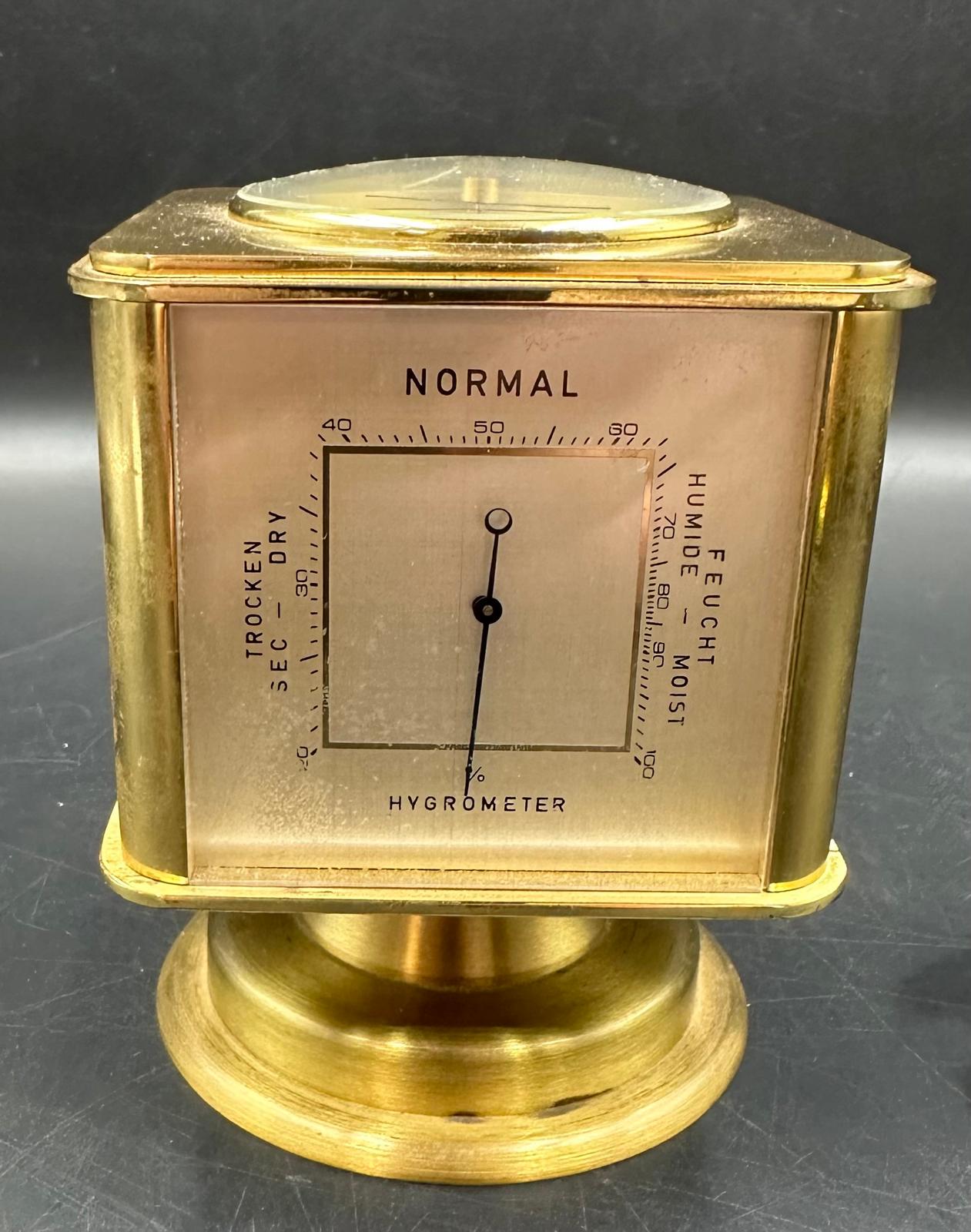 A vintage brass Angelus desk clock/weather station. Having rotating cube shaped body with alarm - Image 3 of 8